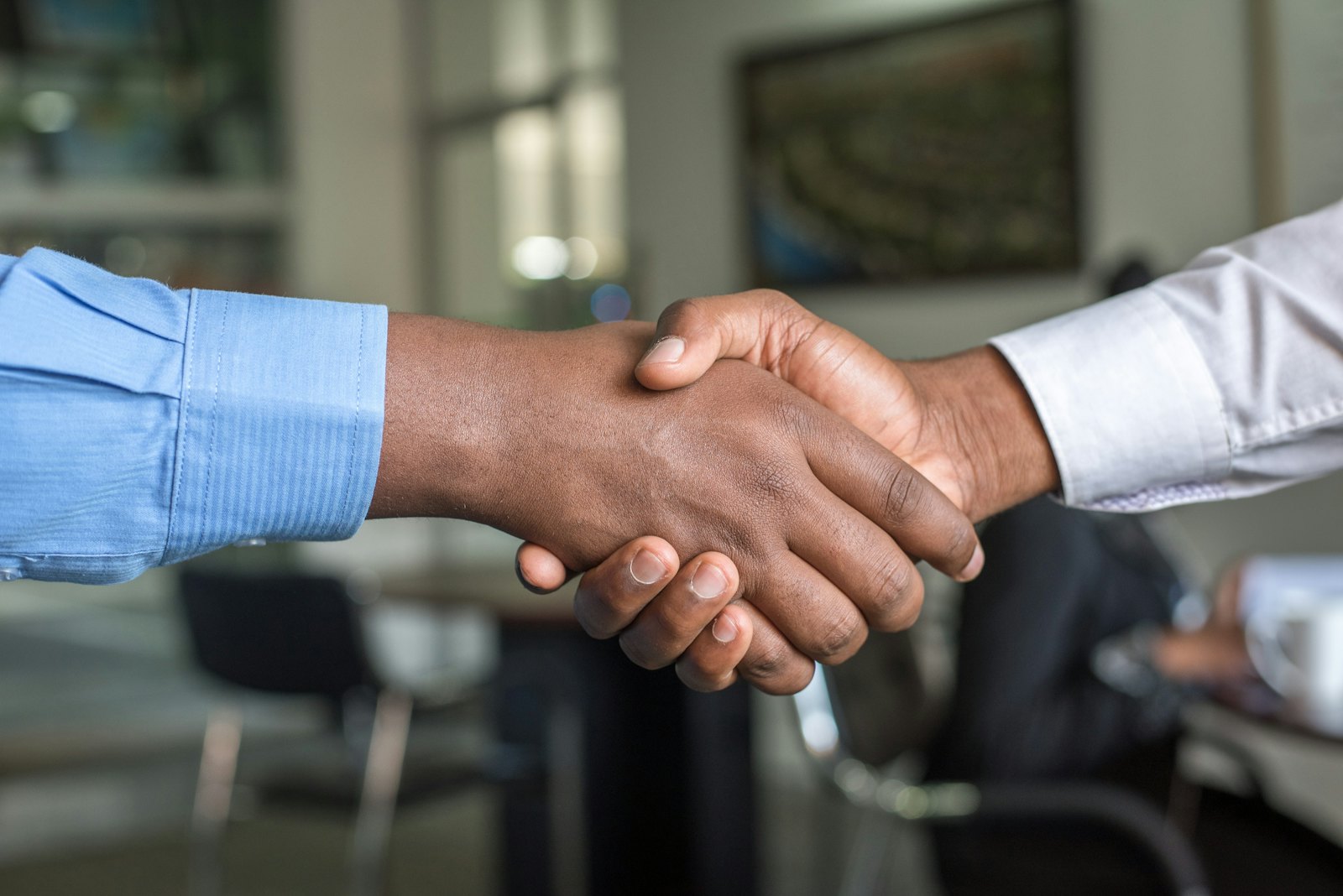 Two professionals discussing a job opportunity